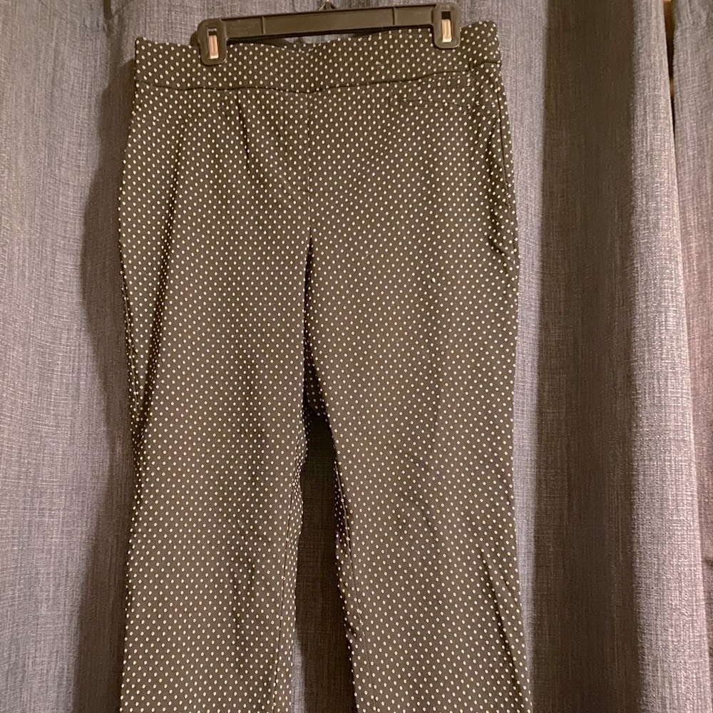 Black pants with white dot detail.